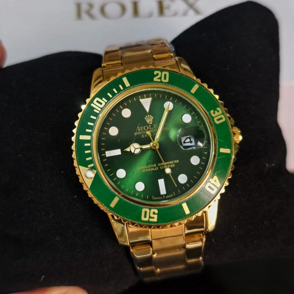 Rolex Oyster Perpetual (with green rotating dial)